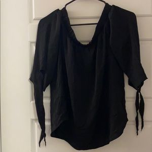 Off the shoulder black satin blouse